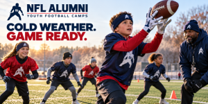 Young football player reaches for a catch while teammates and a coach watch, beside the headline “Cold Weather. Game Ready.”